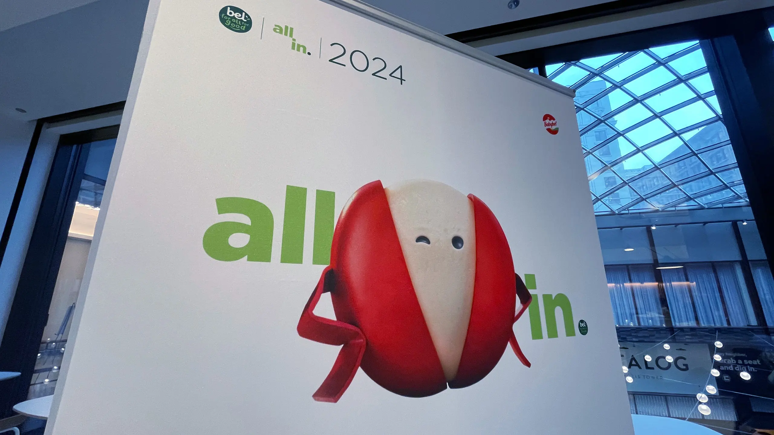 All In 2024 with Mini Babybel character on a pop up banner in the lobby