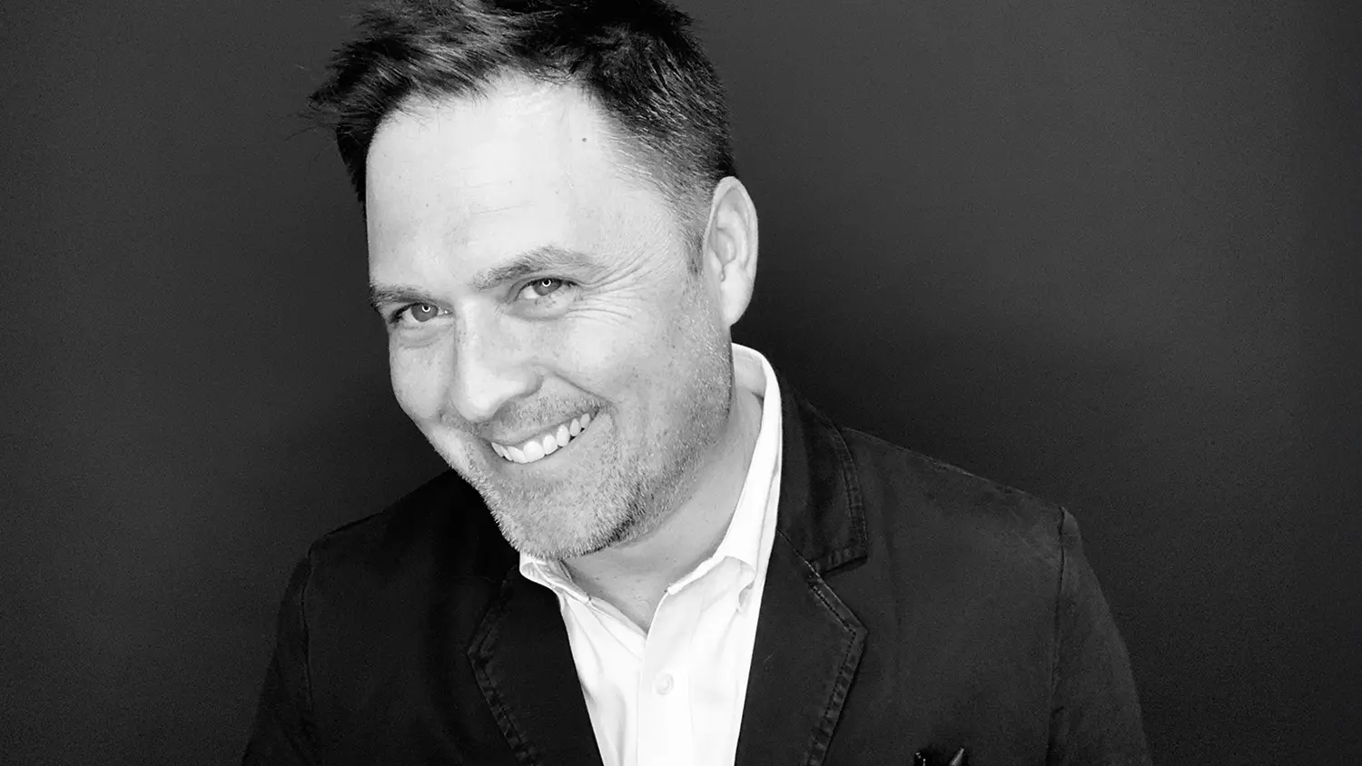 Headshot of Kelly Komp, principal and creative director at Multiple Inc.